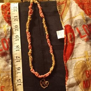 16in handcrafted with Hemp and satin with a sterling silver "Mom" pendent.